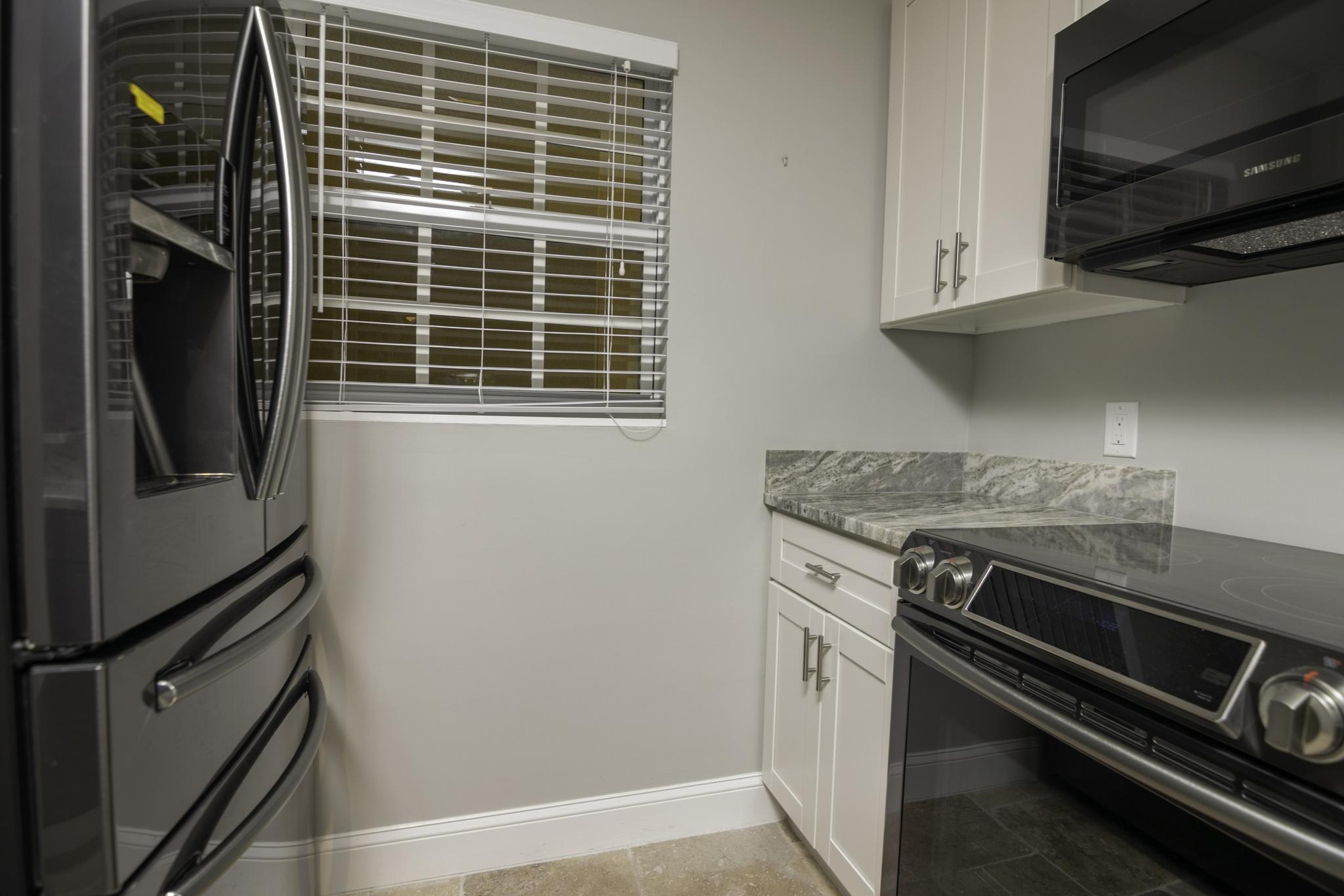 The Fridge Has French Doors and Multiple Lower Doors as Well
