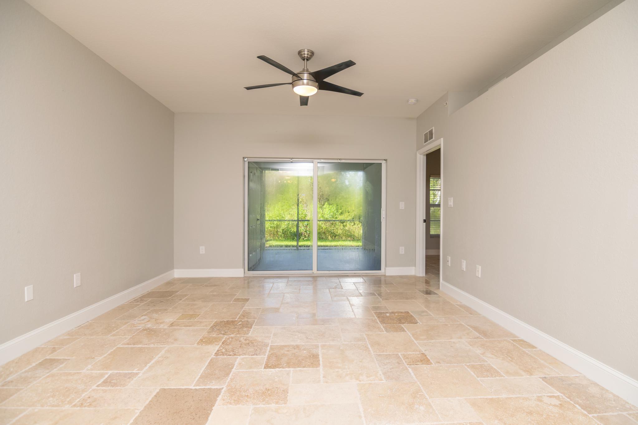 Looking from the kitchen towards the sliding glass doors which lead to the lanai