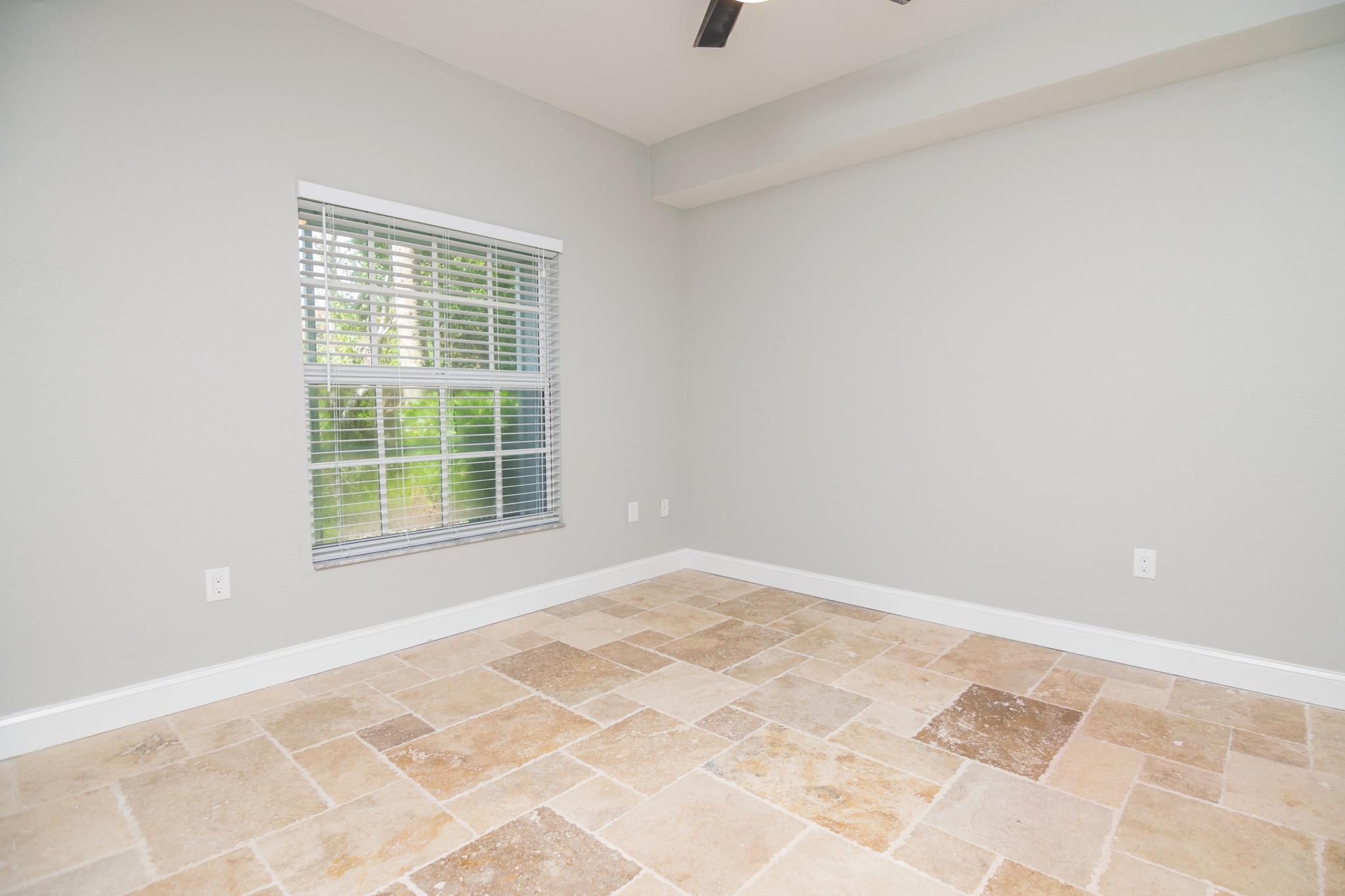 The main bedroom has room for a King bed and a big window with a preserve view.