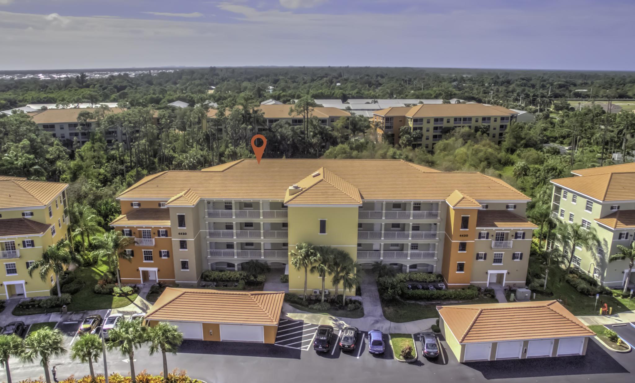 An Aerial Front View of the Building that the Condo is Located In 